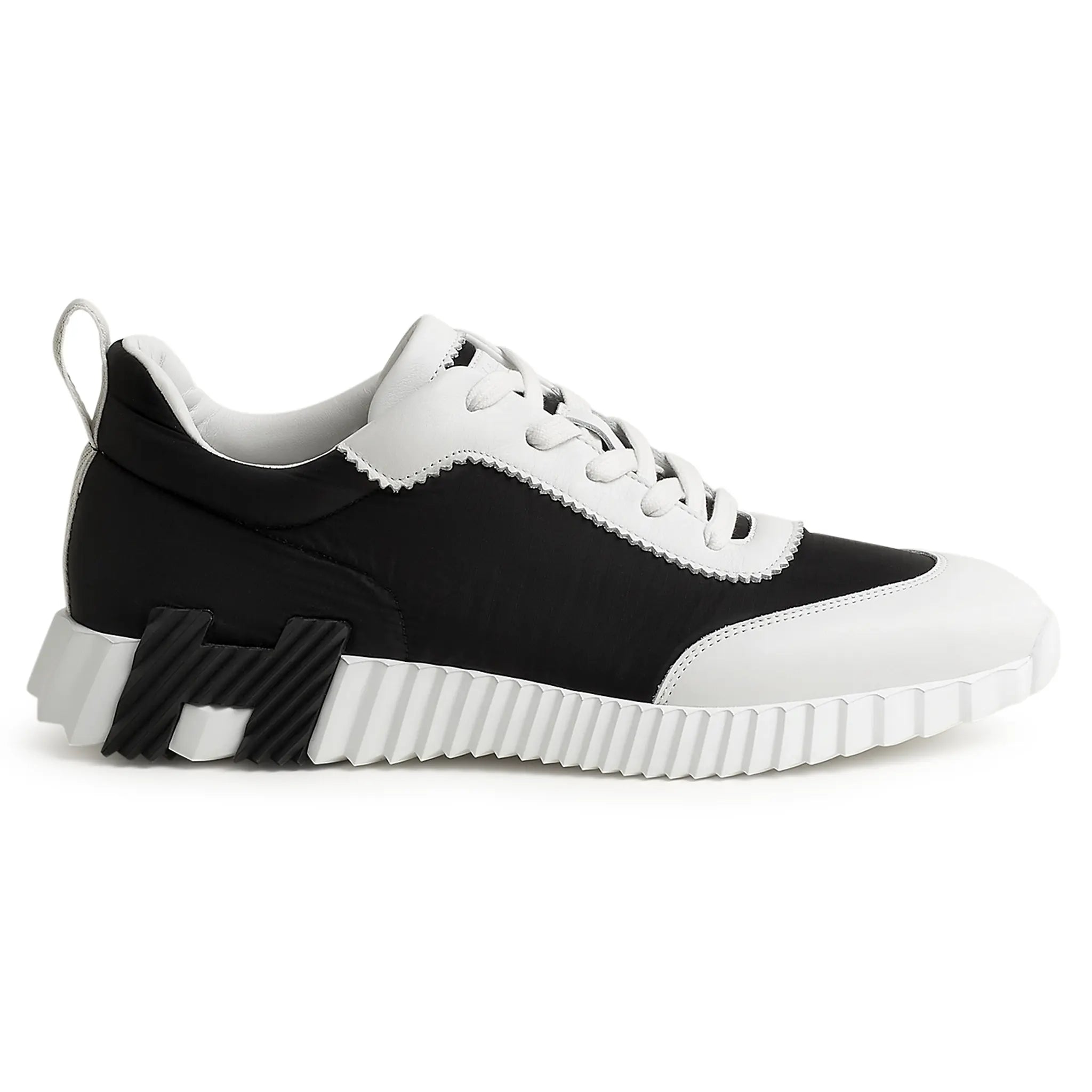 Side view of Hermes Paris Ripstop Bouncing Sneaker Black White H251831ZH02410